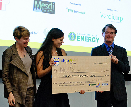 Maryln Colon from Mudpower and Dr. Tom O'Neal pose for a picture after the announcement of Mud Power as the winner of MegaWatt Ventures. 